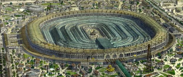 Luftbild einer großen Sportanlage umgeben von Gebäuden, Bäumen und Gras in einer städtischen Umgebung.