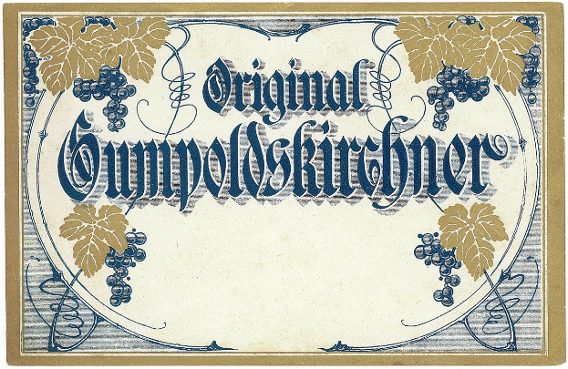 Ein altes deutsches Wein-Etikett mit einer Illustration von Trauben und Blättern, auf dem der Wein-Typ angegeben ist.